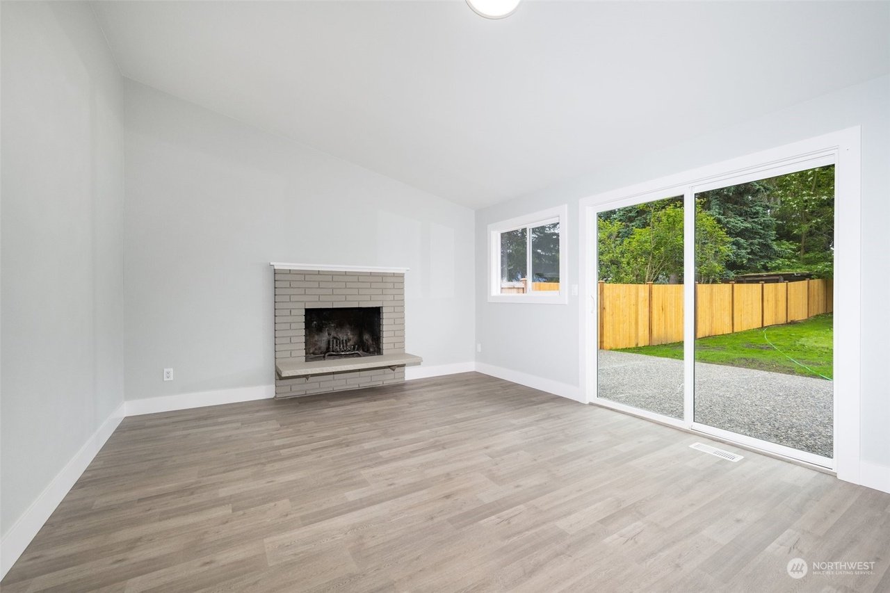 Family room with fireplace and sliding door
