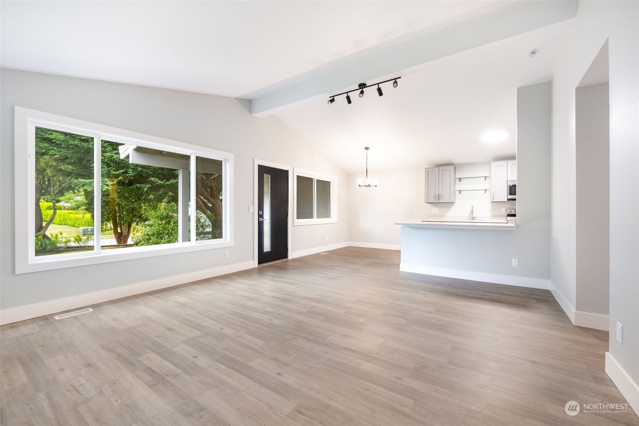 Open living and kitchen space from a whole house remodel